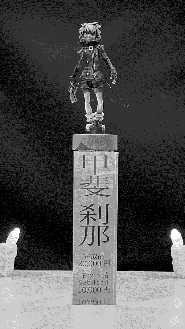 A close up of the Setsuna figure on its display stand.